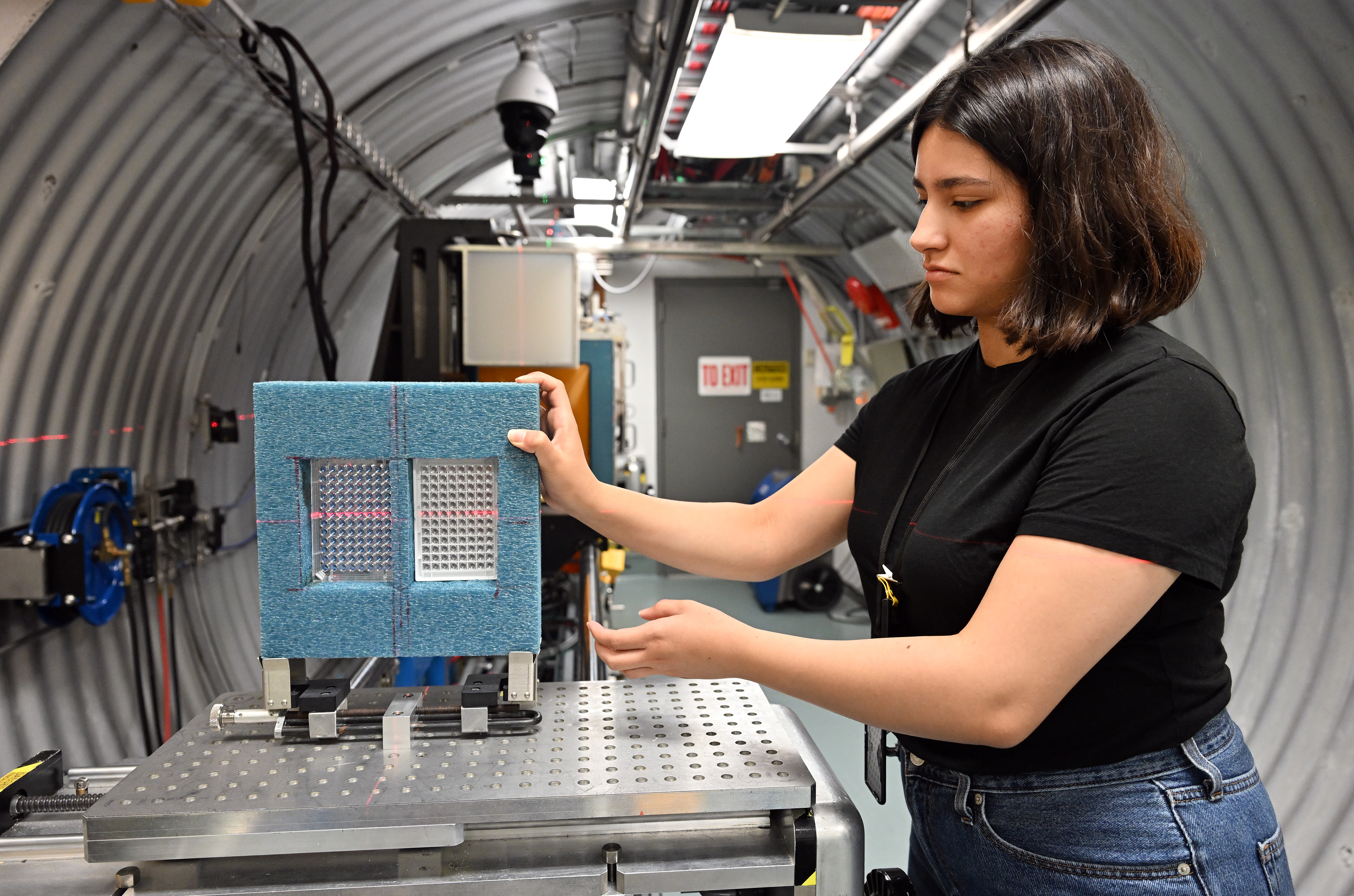 photograph of a person with scientific equipment